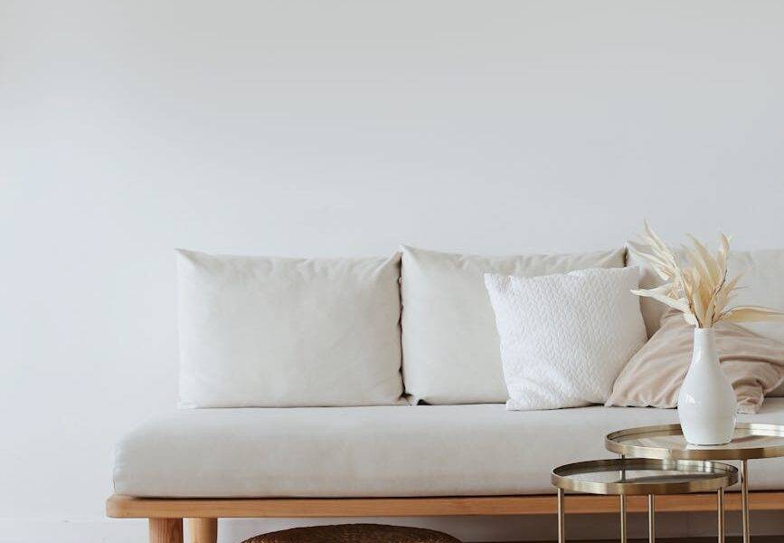 white couch on wooden floor